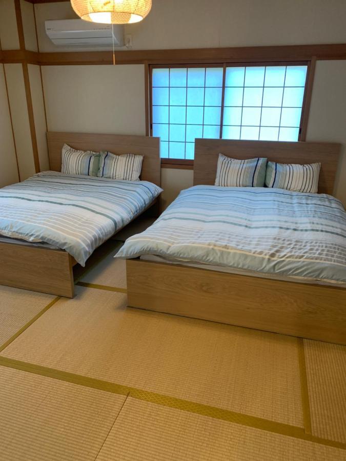 Guest House Apple Osaka Eksteriør billede