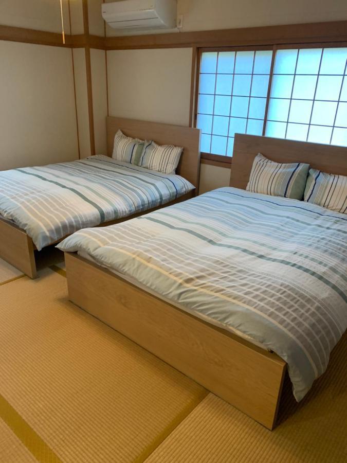Guest House Apple Osaka Eksteriør billede